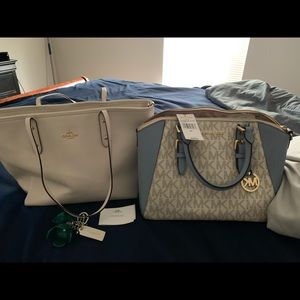 A brand new coach bag and a new Michael kors bag.